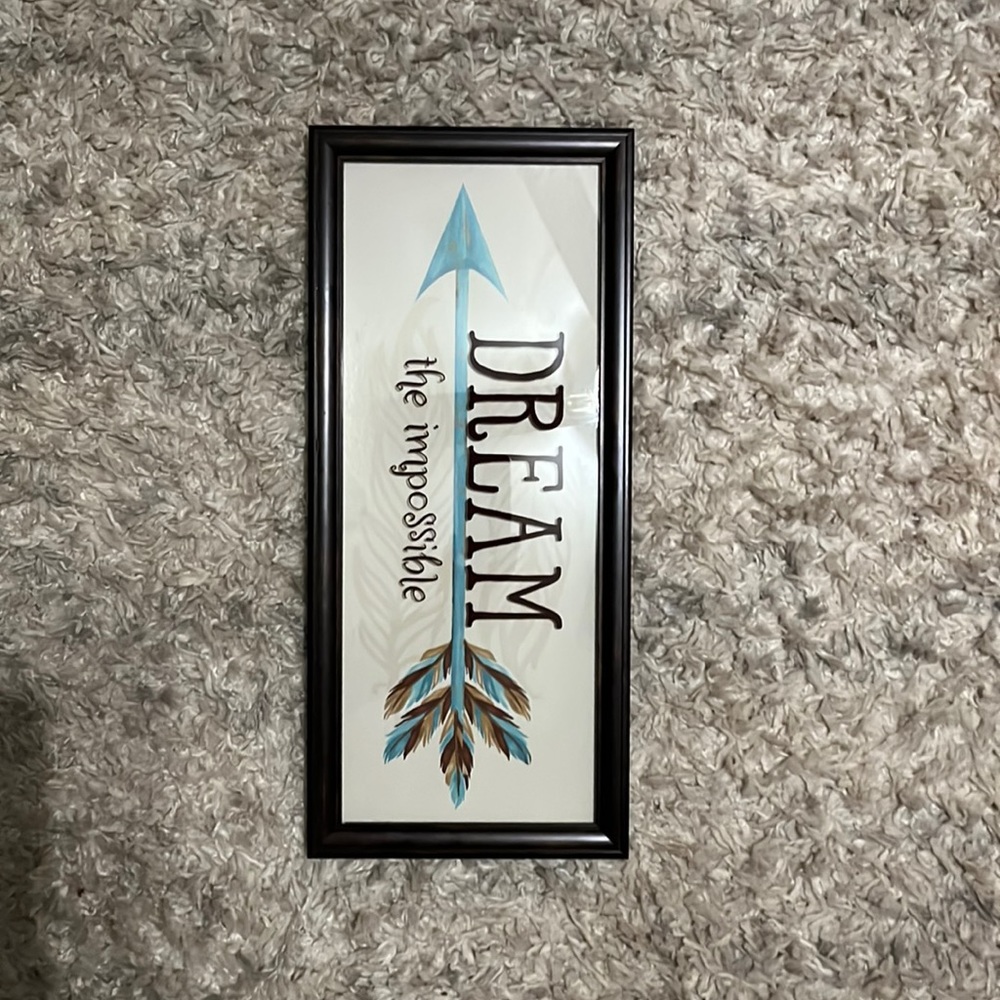 Bought at Dollar General and has never been hung.